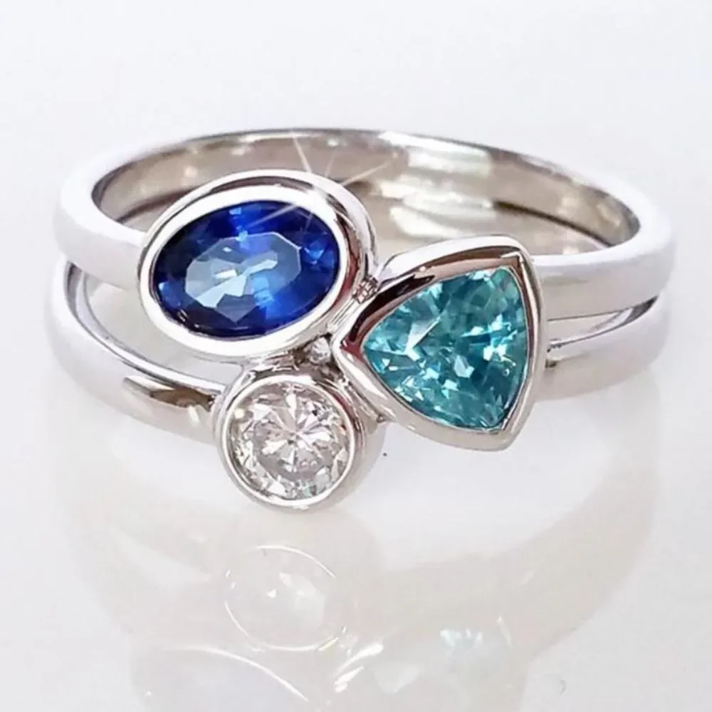 The Shades of blue ring in 925 silver and lab created gem stones sz 5